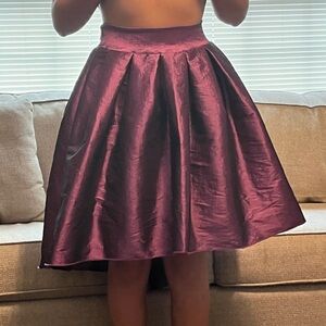 Taffeta Boutique Skirt. Metallic deep plum. High low cut.